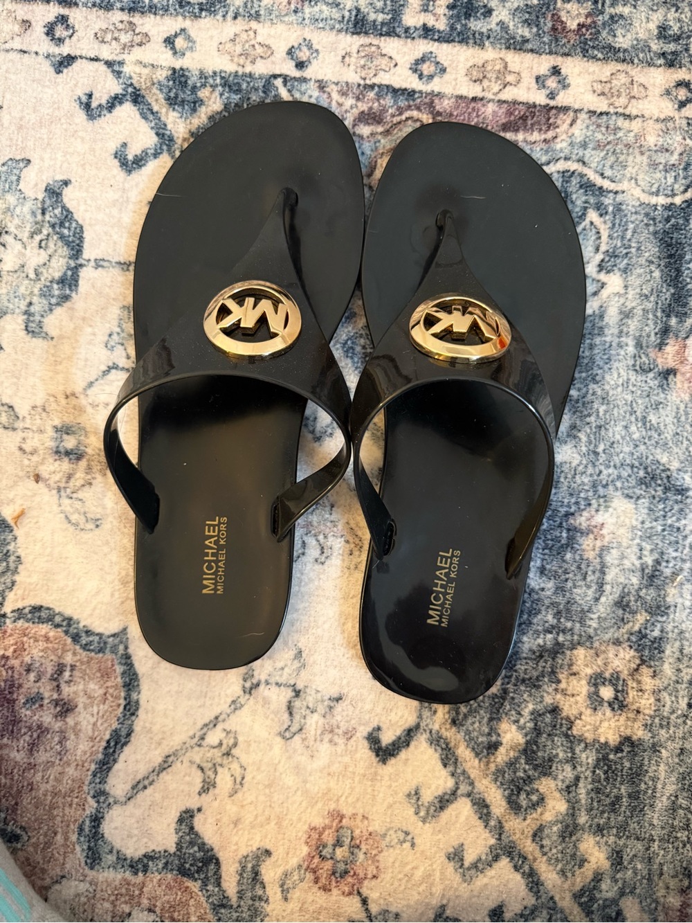 Michael Kors Black Jelly Logo Thong Sandals with Gold Emblem